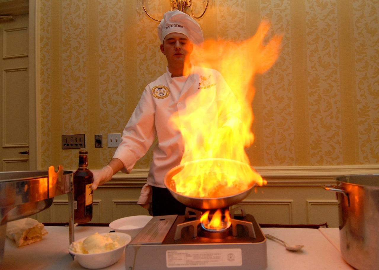 Professional chef cooking in a restaurant kitchen with passion and expertise